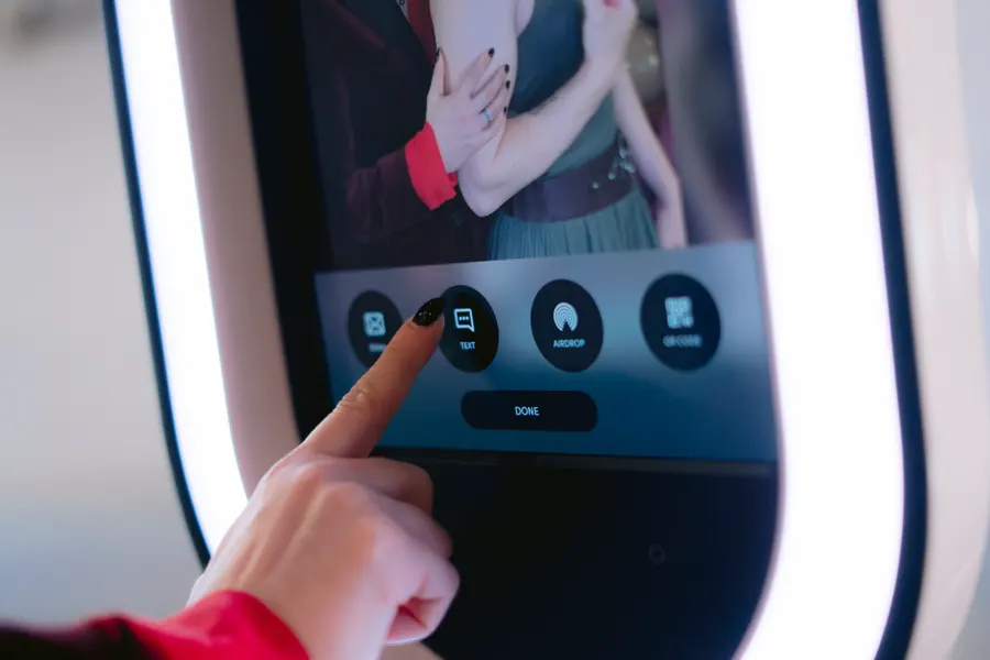 Close up of the photo booth touchscreen sharing options
