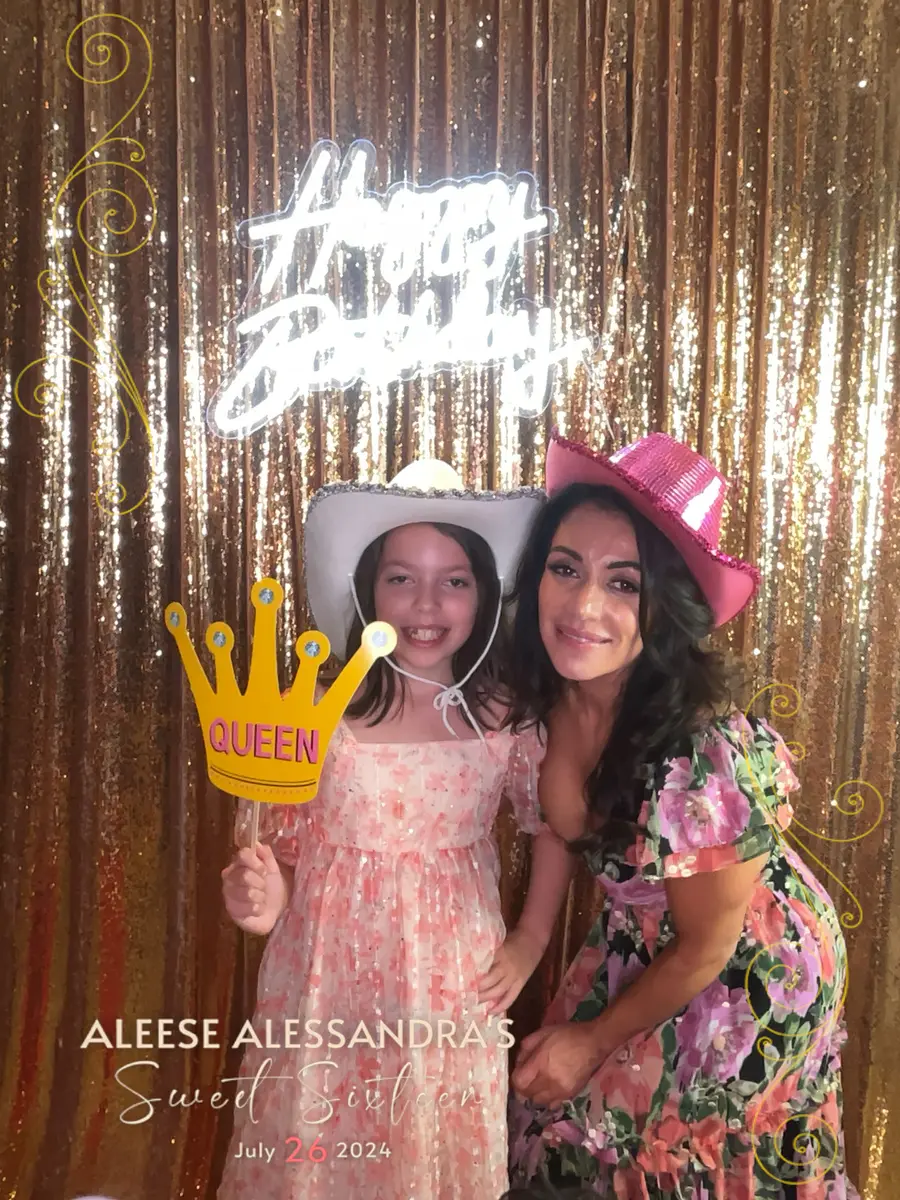 A mother and daughter celebrating a sweet sixteen with a queen crown