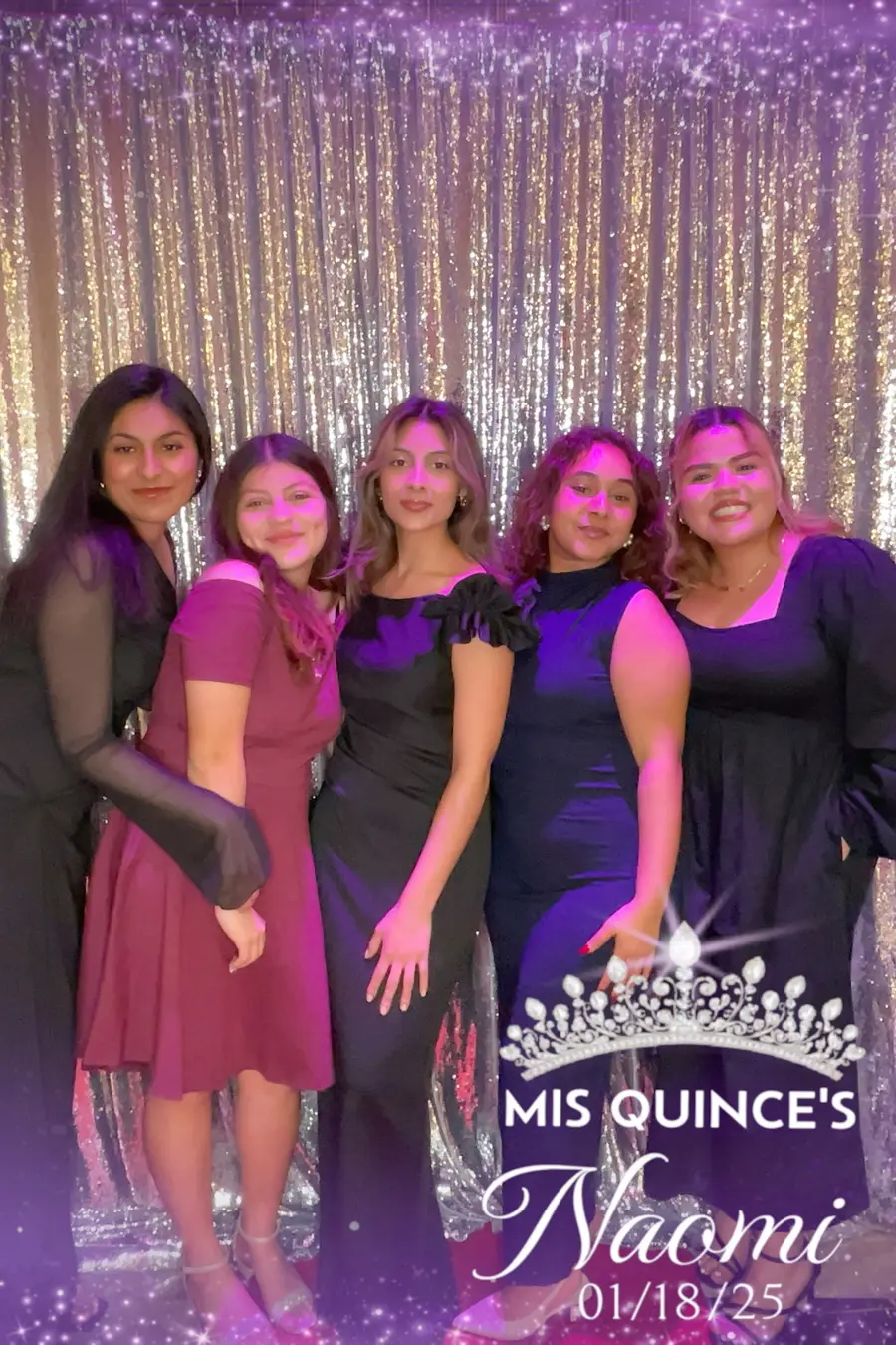 Friends posing together at a quinceañera celebration